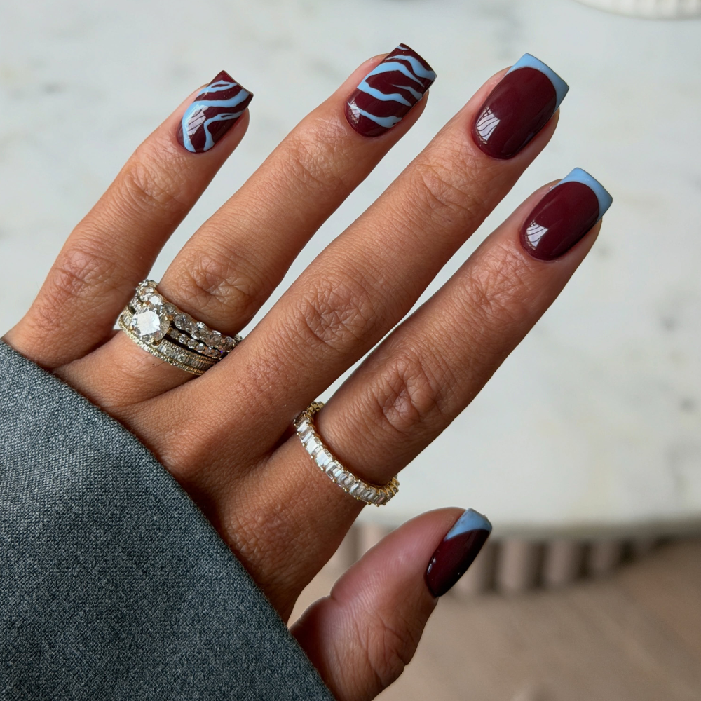 Deep Burgundy With Light Blue French Tips And Wavy Lines — Short Winter Gel Nails