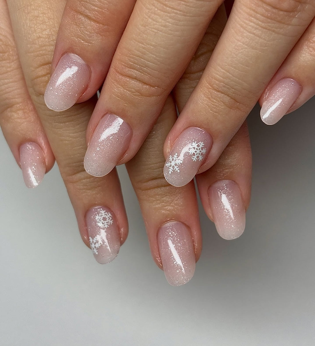 Glitter Glossy Nude Snowflake Glitter Gradient Oval Nails — Winter Glitter Nails