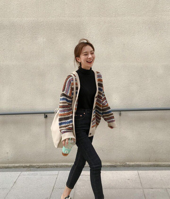 Vibrant Layers: Multicolored Cardigan with Black Turtleneck Vibrant Layers: Multicolored Cardigan with Black Turtleneck — Cardigan Outfits