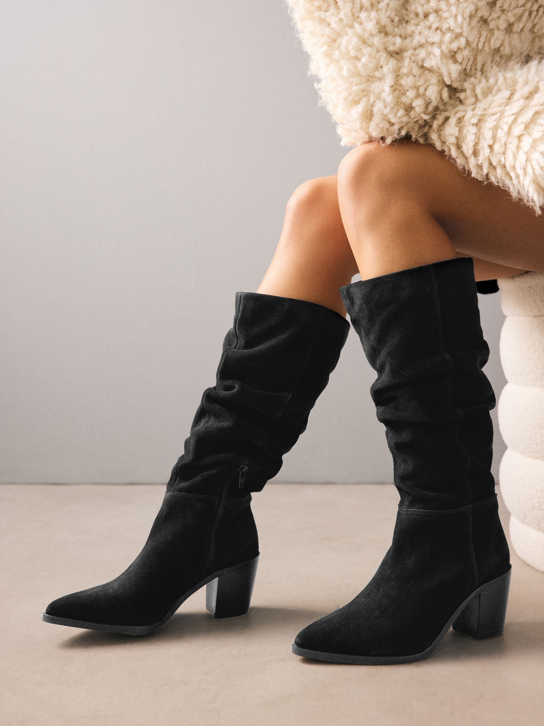 Black Suede Slouchy Boots with Textured Cream Coat — Slouchy Boots Outfits