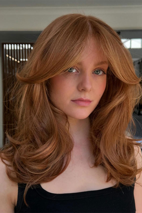 Golden Auburn With Lighter Highlights Collarbone Layers With Voluminous Bangs Golden Auburn With Lighter Highlights Collarbone Layers With Voluminous Bangs — Winter Haircuts with Bangs