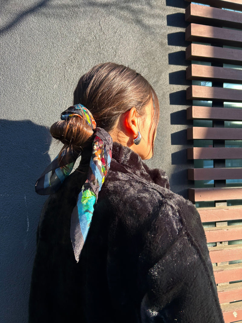 Neat Bun with Elegantly Wrapped Scarf Neat Bun with Elegantly Wrapped Scarf — Winter Hairstyles with Scarf