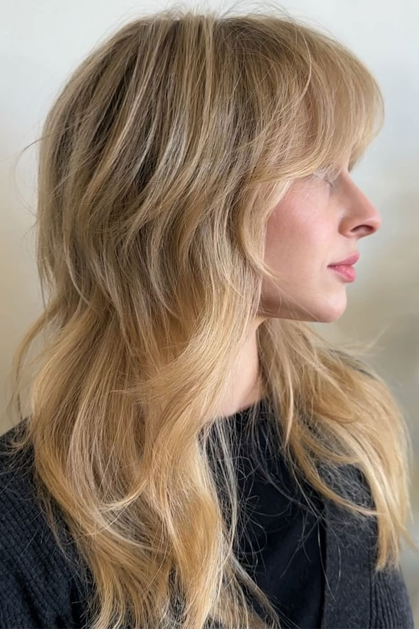 Wavy Medium Density Ash Blonde Collarbone Shag With Choppy Layers Wavy Medium Density Ash Blonde Collarbone Shag With Choppy Layers — Winter Shag Haircuts
