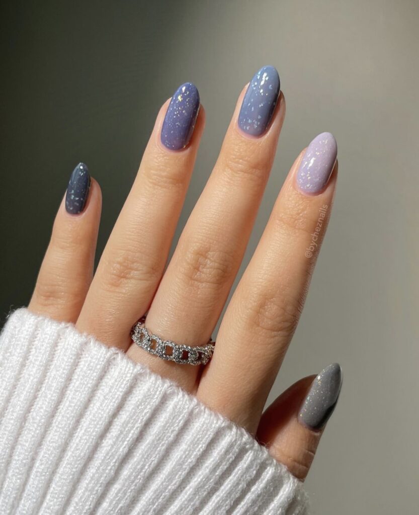 Scattered Glitter And Small Star Shapes Visual Idea — Winter Gel Nails