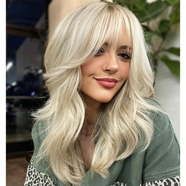 Ash Blonde Shag With Voluminous Waves Ash Blonde Shag With Voluminous Waves — Winter Haircuts with Bangs