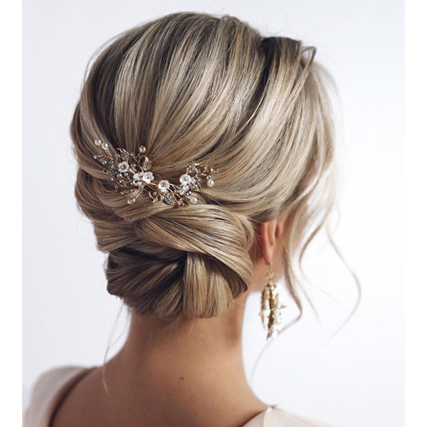 Light Blonde Chignon with Jeweled Accessory Light Blonde Chignon with Jeweled Accessory — Winter Updos