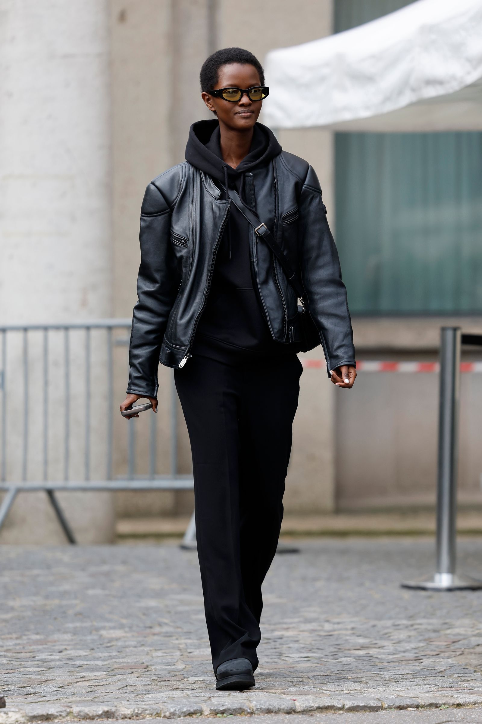Black Hoodie Under a Leather Jacket with Wide-Leg Trousers Black Hoodie Under a Leather Jacket with Wide-Leg Trousers — Hoodie Outfits