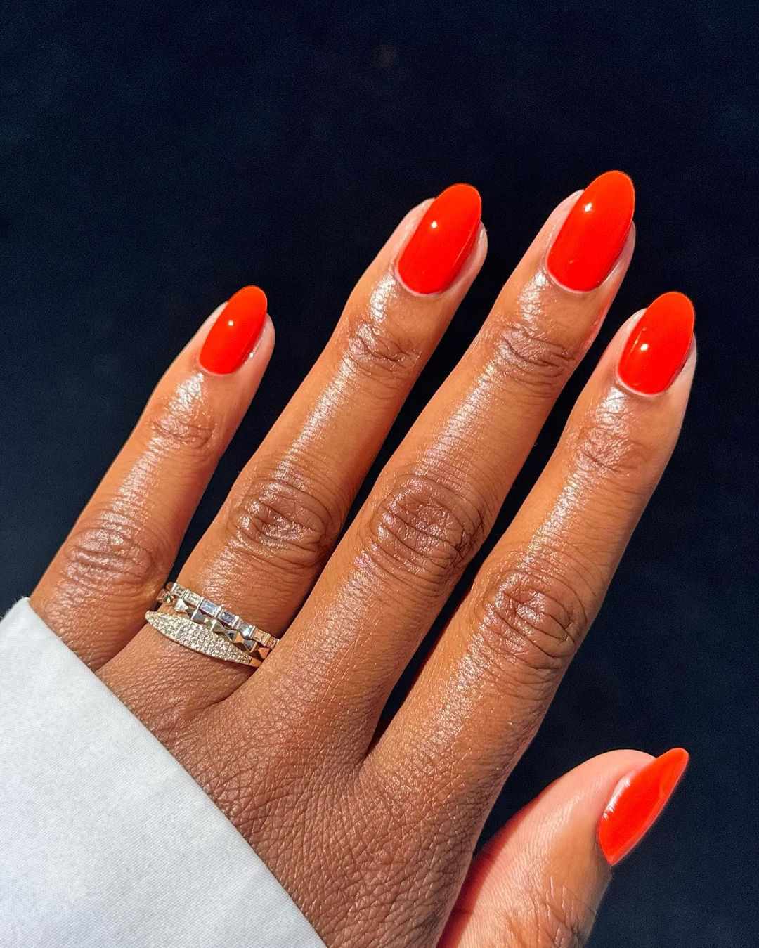 Vibrant Orange Glossy Medium Oval Nails Vibrant Orange Glossy Medium Oval Nails — Winter Nail Colors for Dark Skin