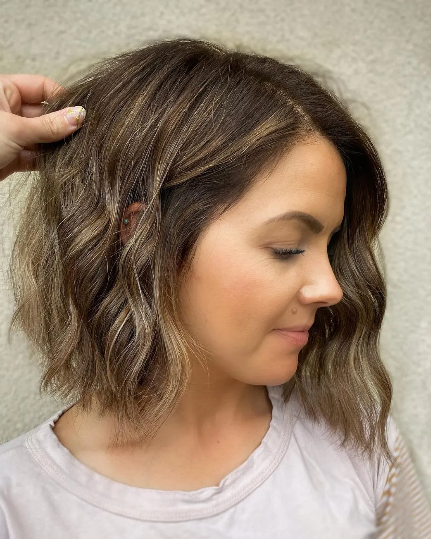 Wavy Angled Bob With Balayage Wavy Angled Bob With Balayage — Low Maintenance Winter Haircuts