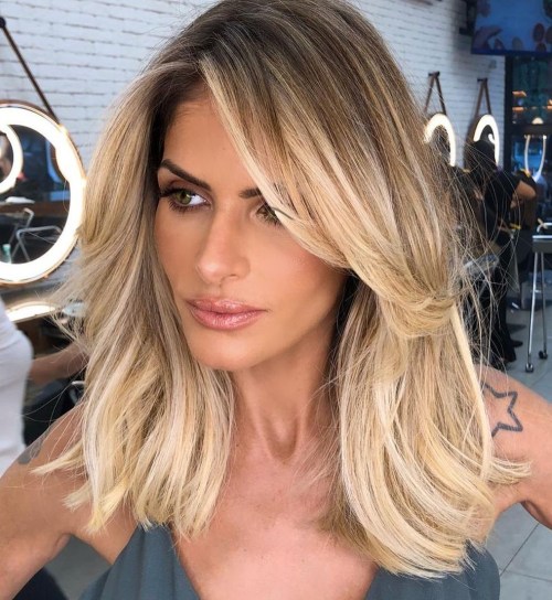 Layered Bob With Curtain Bangs Layered Bob With Curtain Bangs — Low Maintenance Winter Haircuts