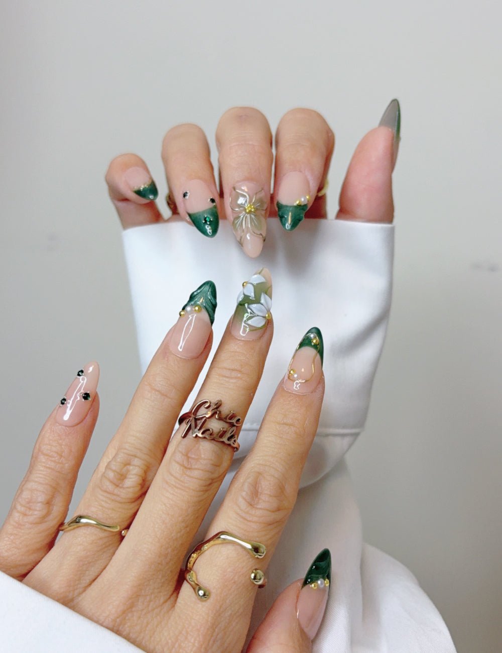 The Single Detail A Reader Notices First Floral Embellished Emerald French Nails The Single Detail A Reader Notices First Floral Embellished Emerald French Nails — Emerald Green Nails