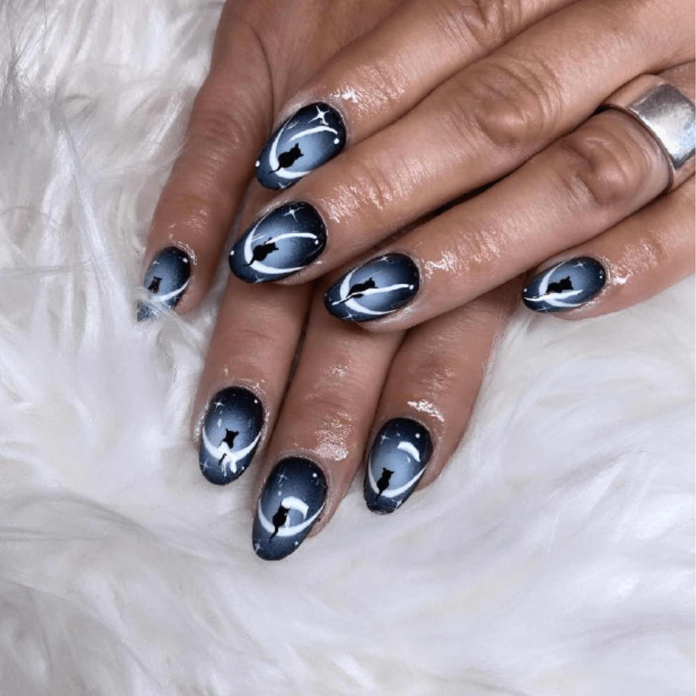 One Hand Close-Up Visual Idea — Winter Oval Nails