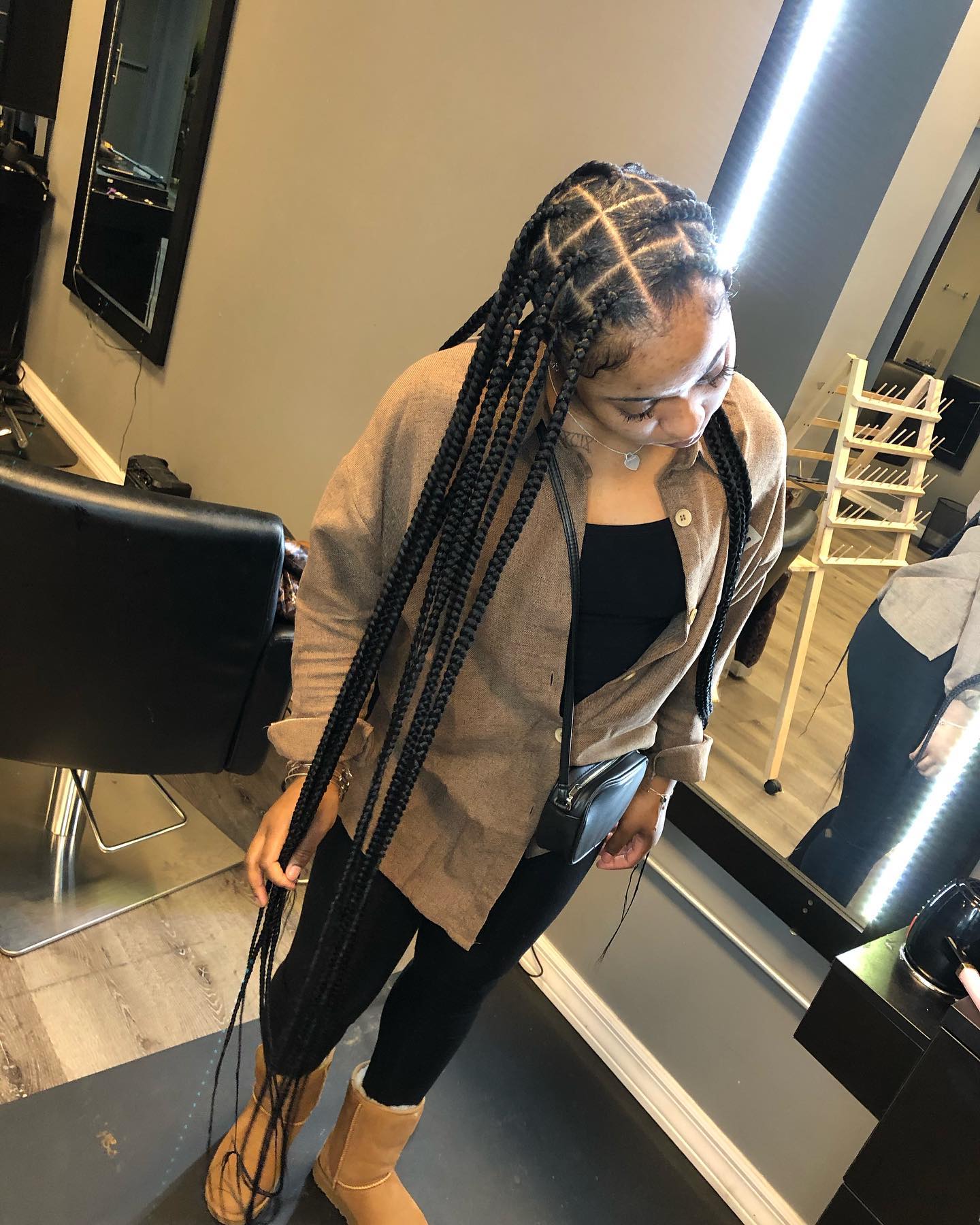 Mid-Back Black Braids in a High Ponytail Mid-Back Black Braids in a High Ponytail — Winter Knotless Braids