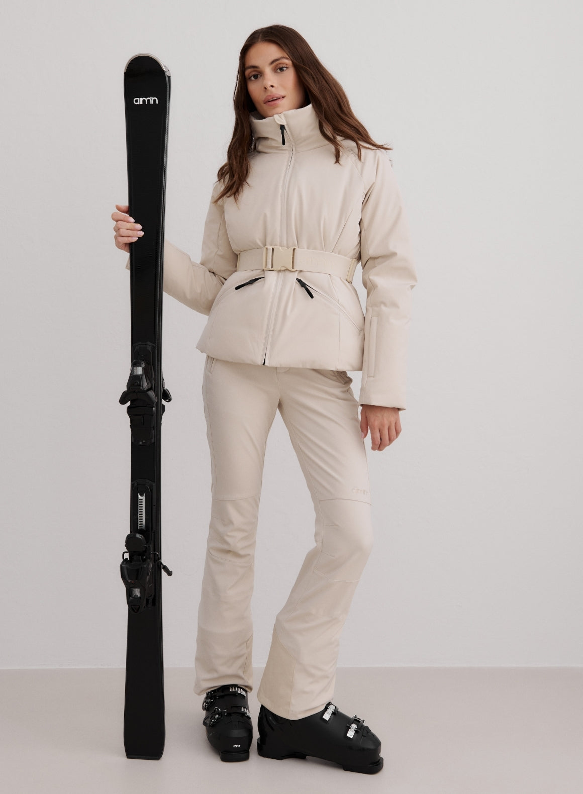Cream Belted Ski Jacket for a Chic Winter Sport Ensemble — Winter Jackets for Women