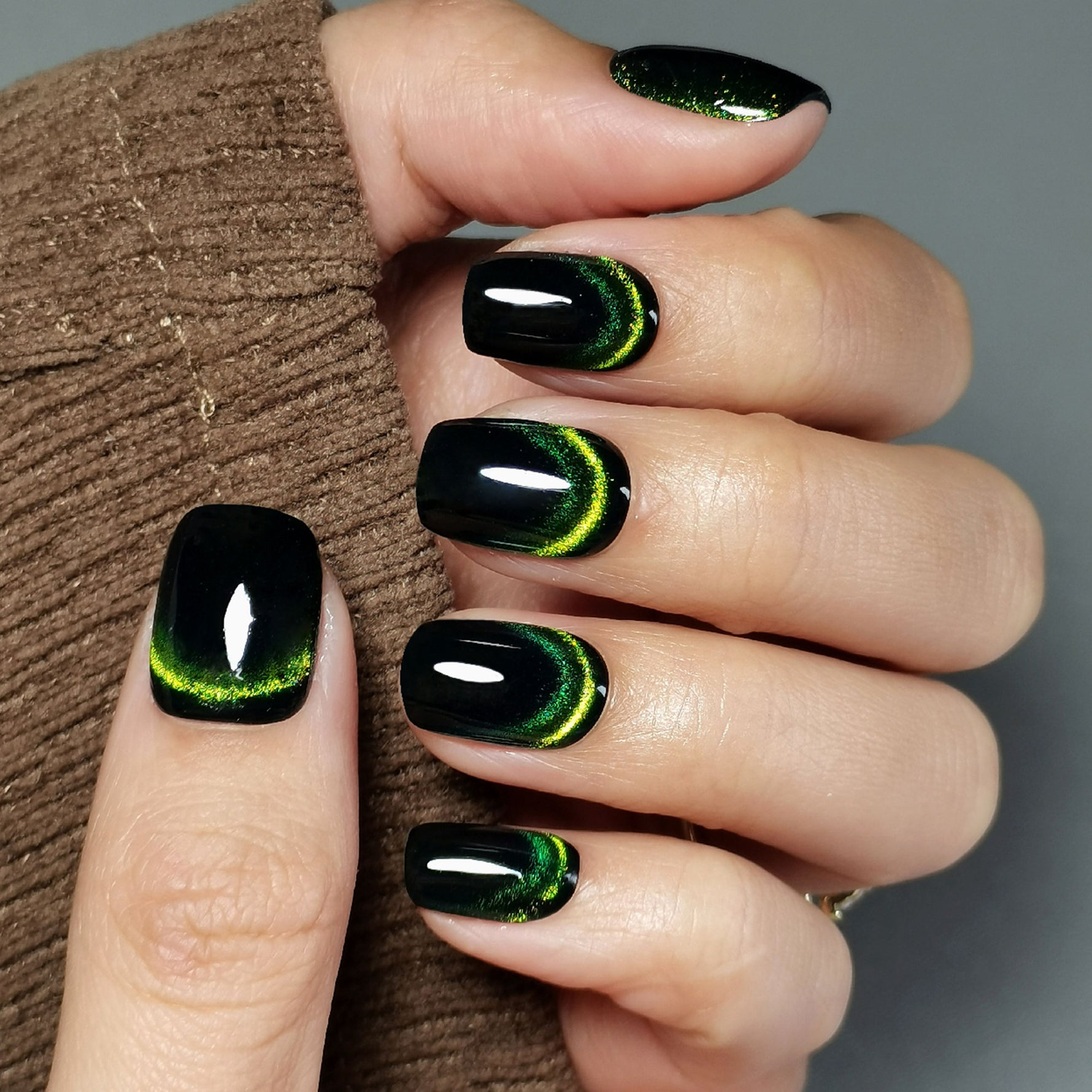Black with Striking Green Cat Eye Black with Striking Green Cat Eye — Green Nail Designs