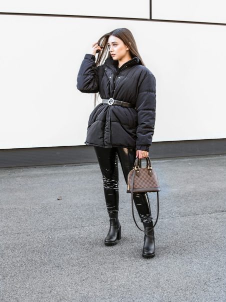 Cinched Black Puffer Coat with Skinny Pants — Long Puffer Coat Outfits