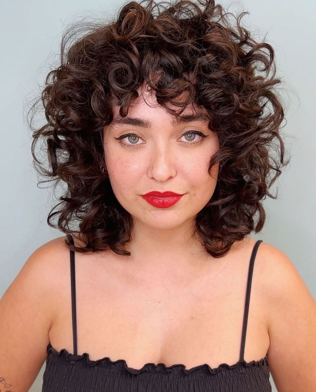 Dark Brown Bob With Red Undertones Dark Brown Bob With Red Undertones — Winter Hair Colors for Curly Hair