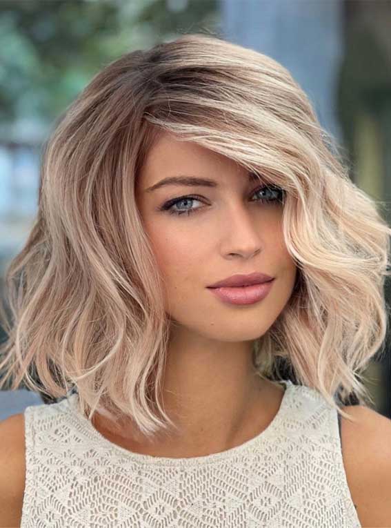 Rose Blonde Wavy Lob With Wispy Bangs Rose Blonde Wavy Lob With Wispy Bangs — Winter Haircuts for Wavy Hair