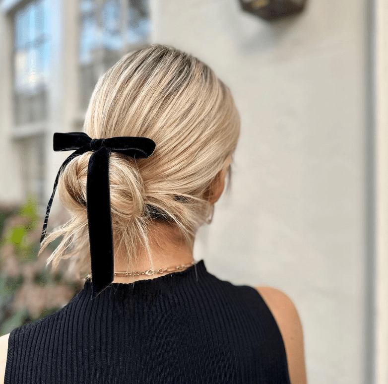 Low Bun With Black Velvet Bow Low Bun With Black Velvet Bow — Winter Wedding Hairstyles