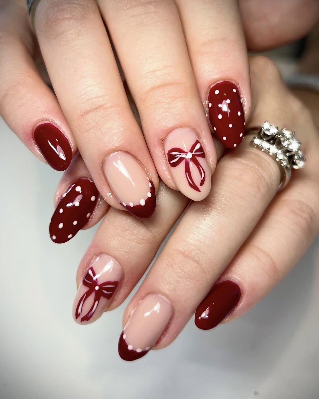 Red French Tip Polka Dot Almonds — Winter Red Nails