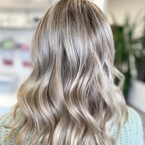 Dimensional Blonde Wavy Curls — Aesthetic Winter Hairstyles