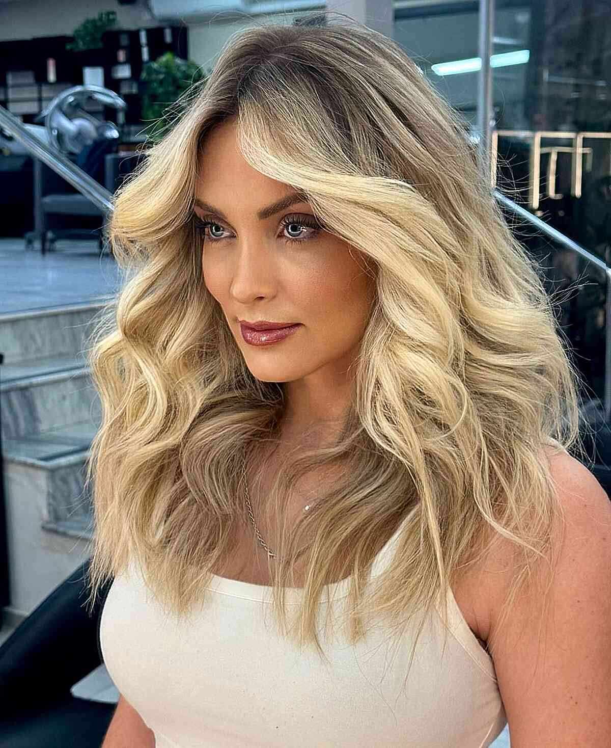 Ash Blonde Layered Lob With Waves Ash Blonde Layered Lob With Waves — Low Maintenance Winter Haircuts