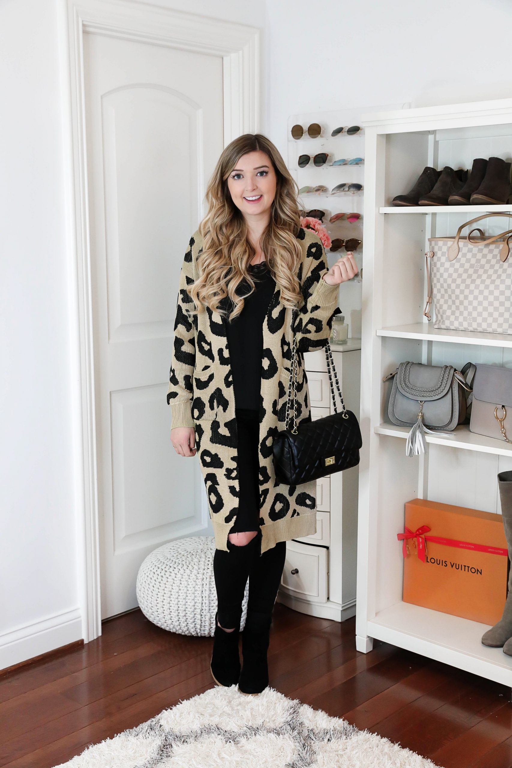 Leopard Print Cardigan Over Black Top and Ripped Jeans — Winter to Spring Transition Outfits