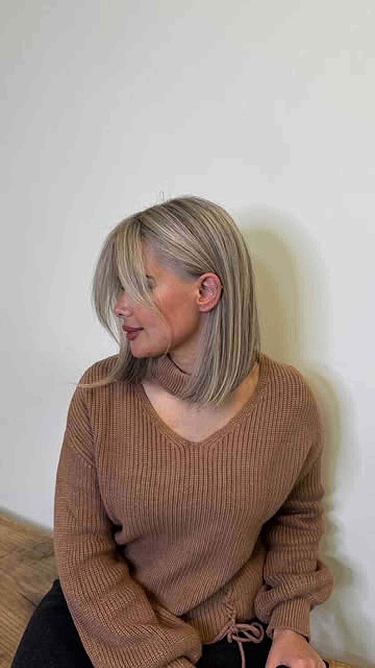 Side-Swept Chin Bob Ash Blonde With Subtle Lowlights Side-Swept Chin Bob Ash Blonde With Subtle Lowlights — Lowlights for Blonde Hair