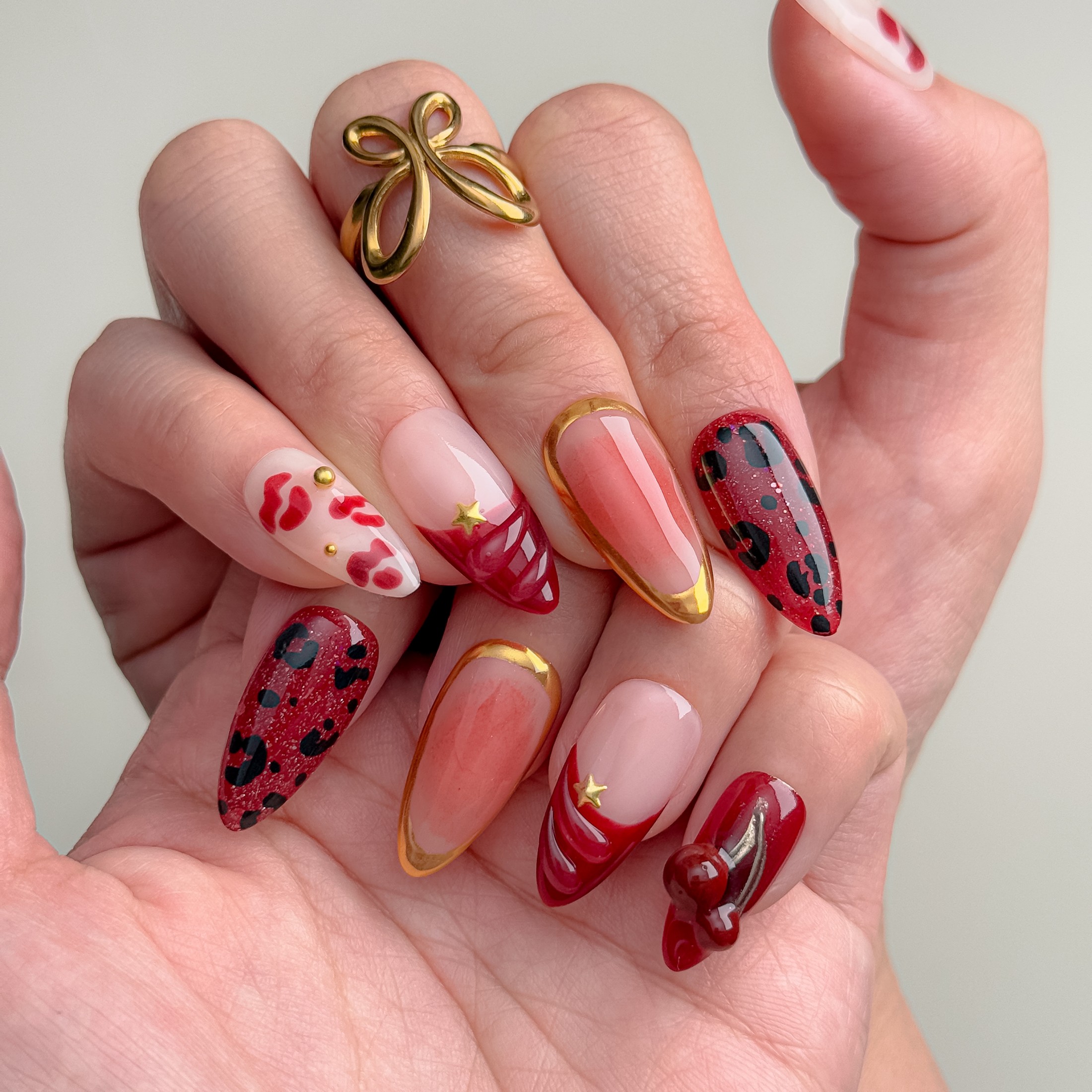 3D Cherry Charms and Leopard Print Almond Nails 3D Cherry Charms and Leopard Print Almond Nails — Cherry Red Nails
