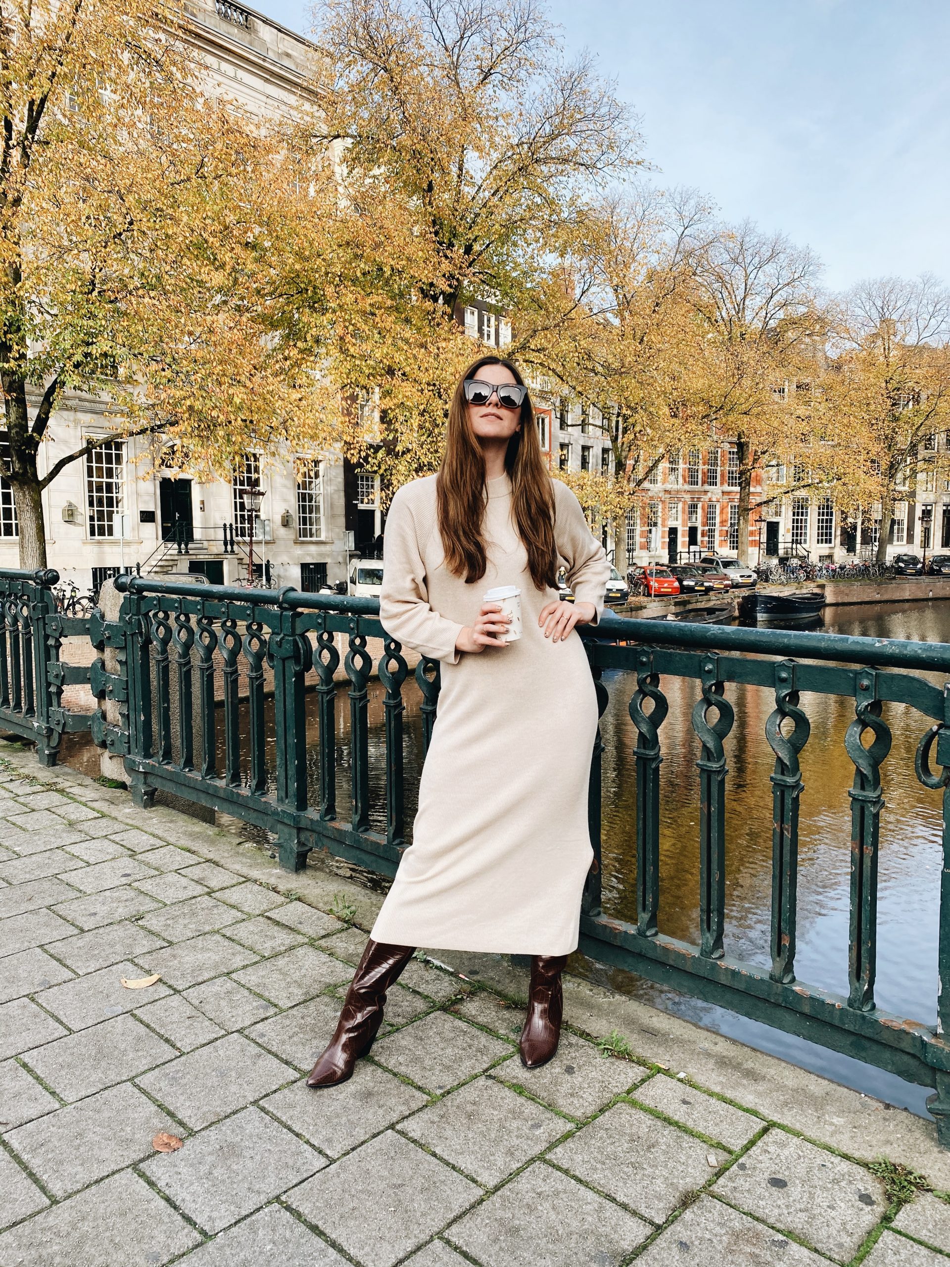 Long Beige Crewneck Sweater Dress with Leopard Print Clutch Long Beige Crewneck Sweater Dress with Leopard Print Clutch — Sweater Dress Outfits