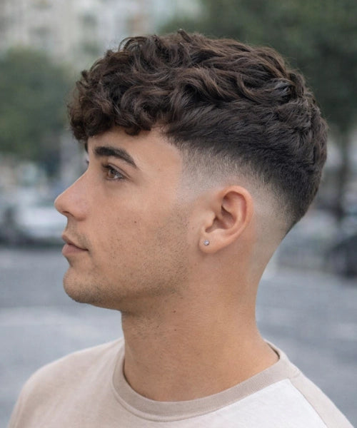 Textured Curly Crop With Low Fade — Winter Haircuts for Men