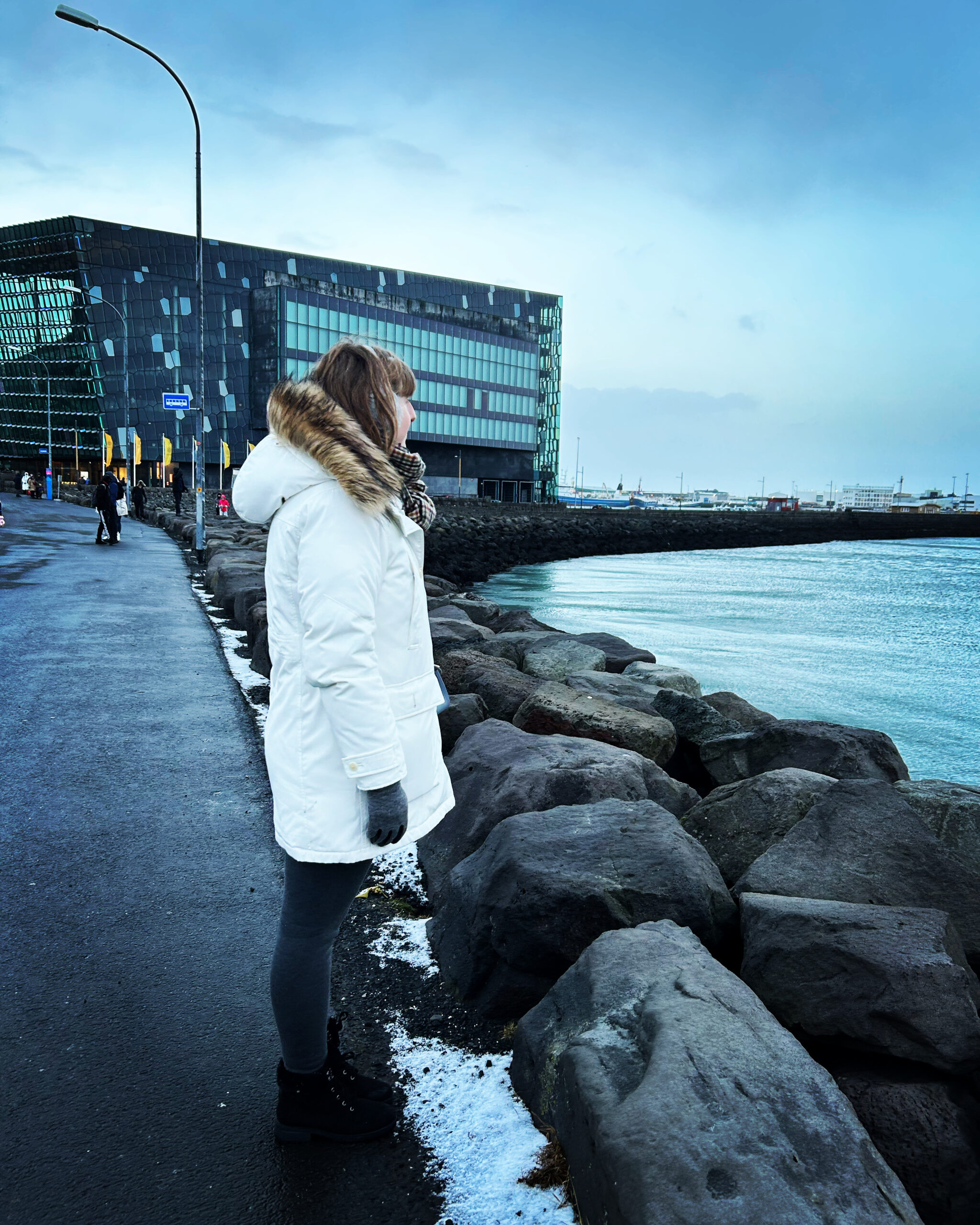 White Parka with Fur Hood and Grey Leggings for Cold Climates White Parka with Fur Hood and Grey Leggings for Cold Climates — Iceland Winter Outfits