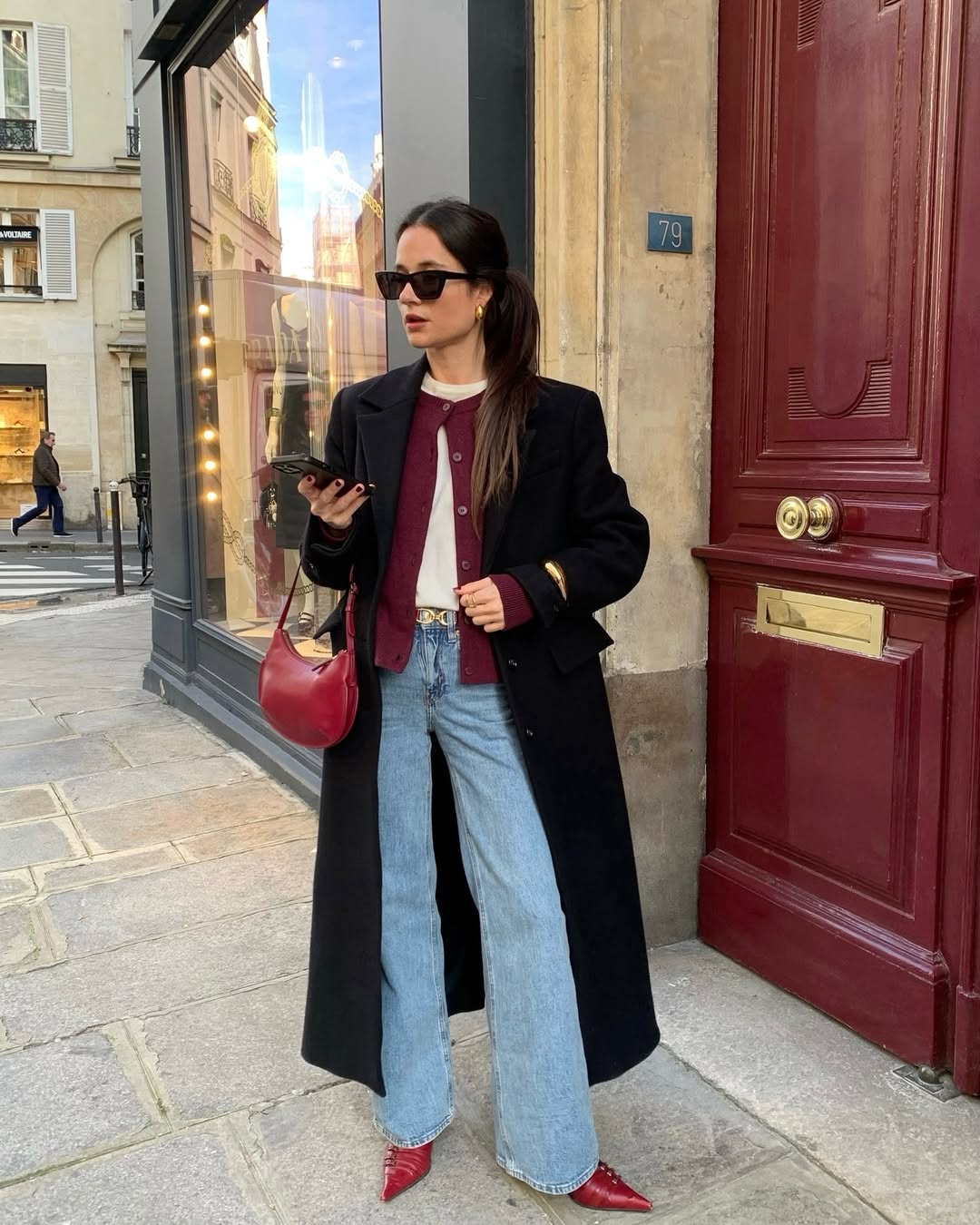 Long Black Coat Over Cardigan and Jeans — Europe Winter Outfits