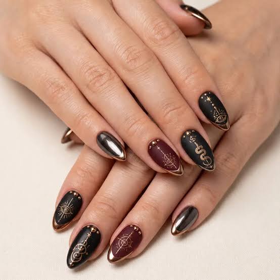 Matte Black Gold Symbol Stiletto Nails Matte Black Gold Symbol Stiletto Nails — Dark Winter Nails