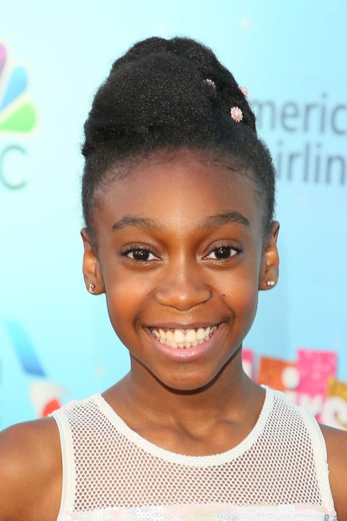 High Updo With Decorative Beads — Winter Hairstyles for Black Kids