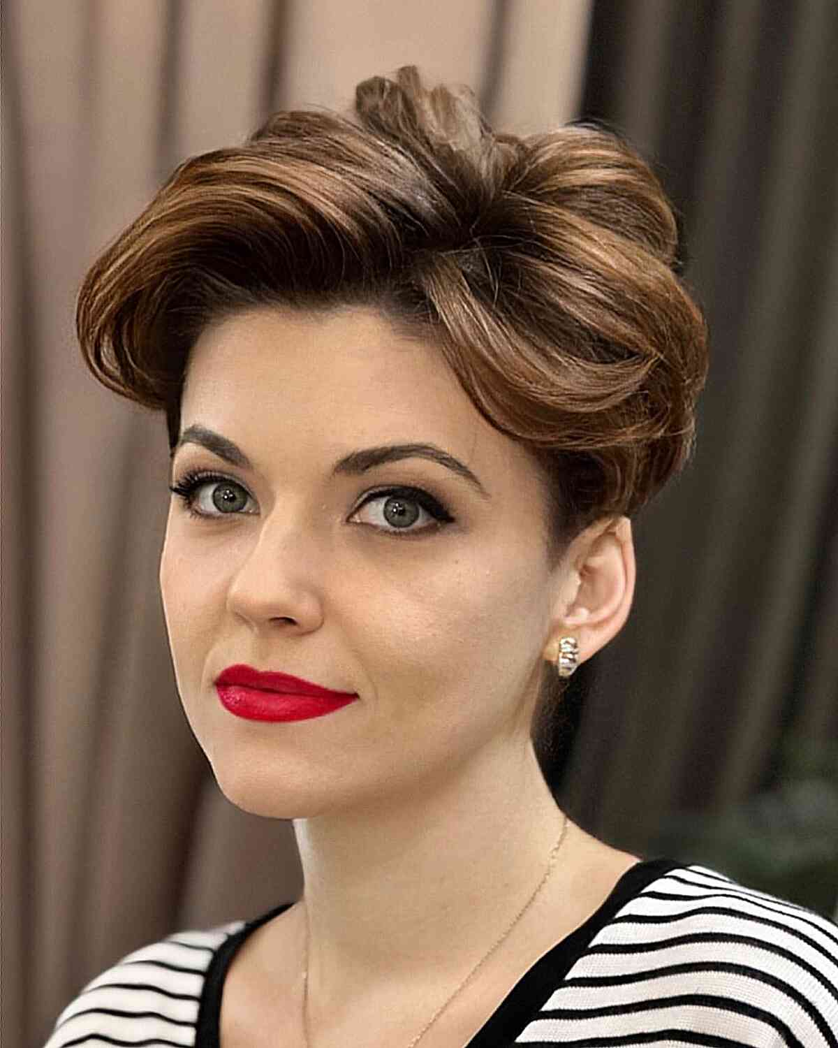 Voluminous Swept-Back Pixie Voluminous Swept-Back Pixie — Winter Haircuts for Oval Faces