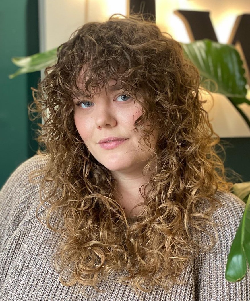 Trendy Honey Blonde Wolf Cut Trendy Honey Blonde Wolf Cut — Winter Haircuts for Curly Hair