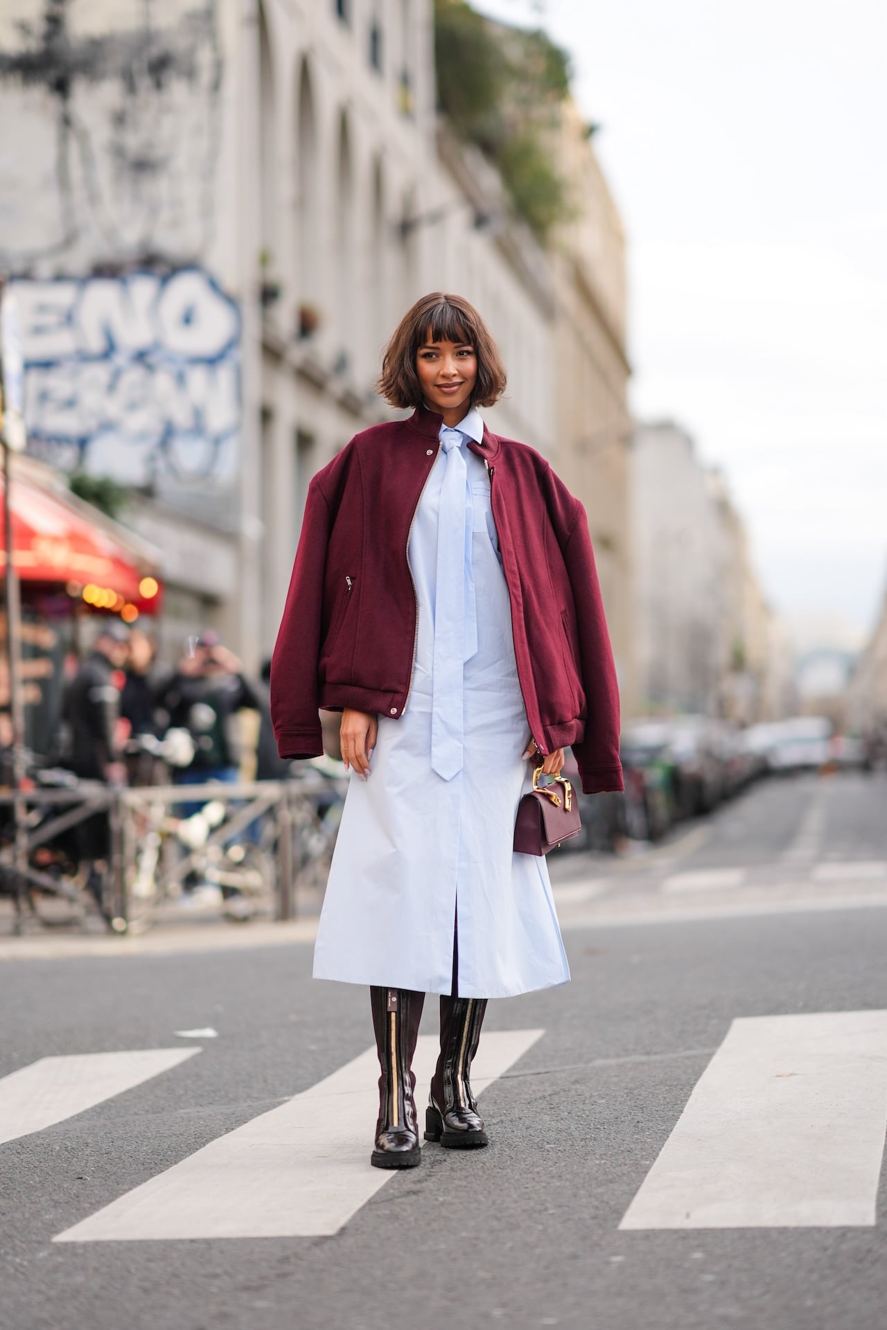 Burgundy Bomber Jacket with a Light Blue Shirt Dress and Leather Boots Burgundy Bomber Jacket with a Light Blue Shirt Dress and Leather Boots — Paris Winter Outfits