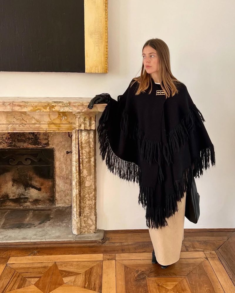 Fringed Poncho Over a Cream Maxi Skirt Fringed Poncho Over a Cream Maxi Skirt — Winter Going Out Outfits