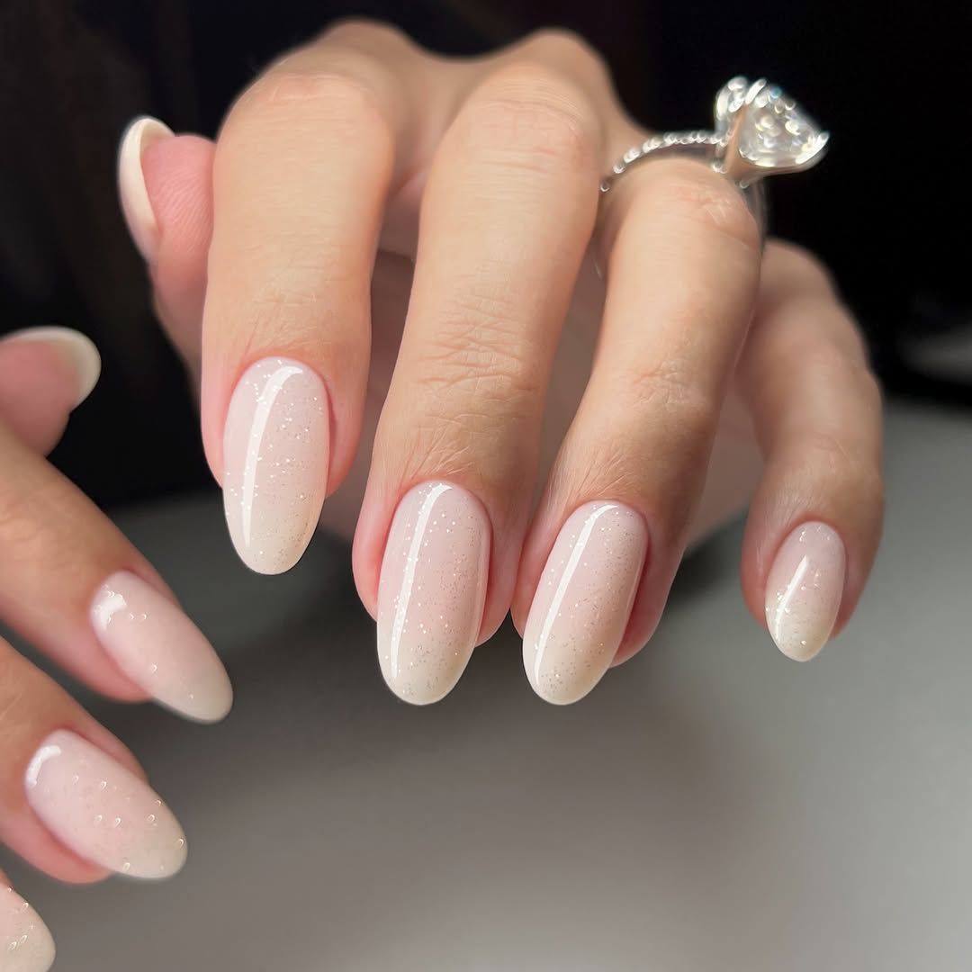 Subtle Shimmer Milky White Oval Nails Subtle Shimmer Milky White Oval Nails — Winter White Nails