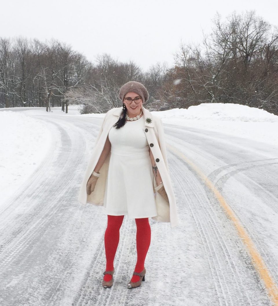White Fit-and-Flare Dress with Cream Coat and Red Tights for a Dressy Winter Look — Dressy Winter Outfits