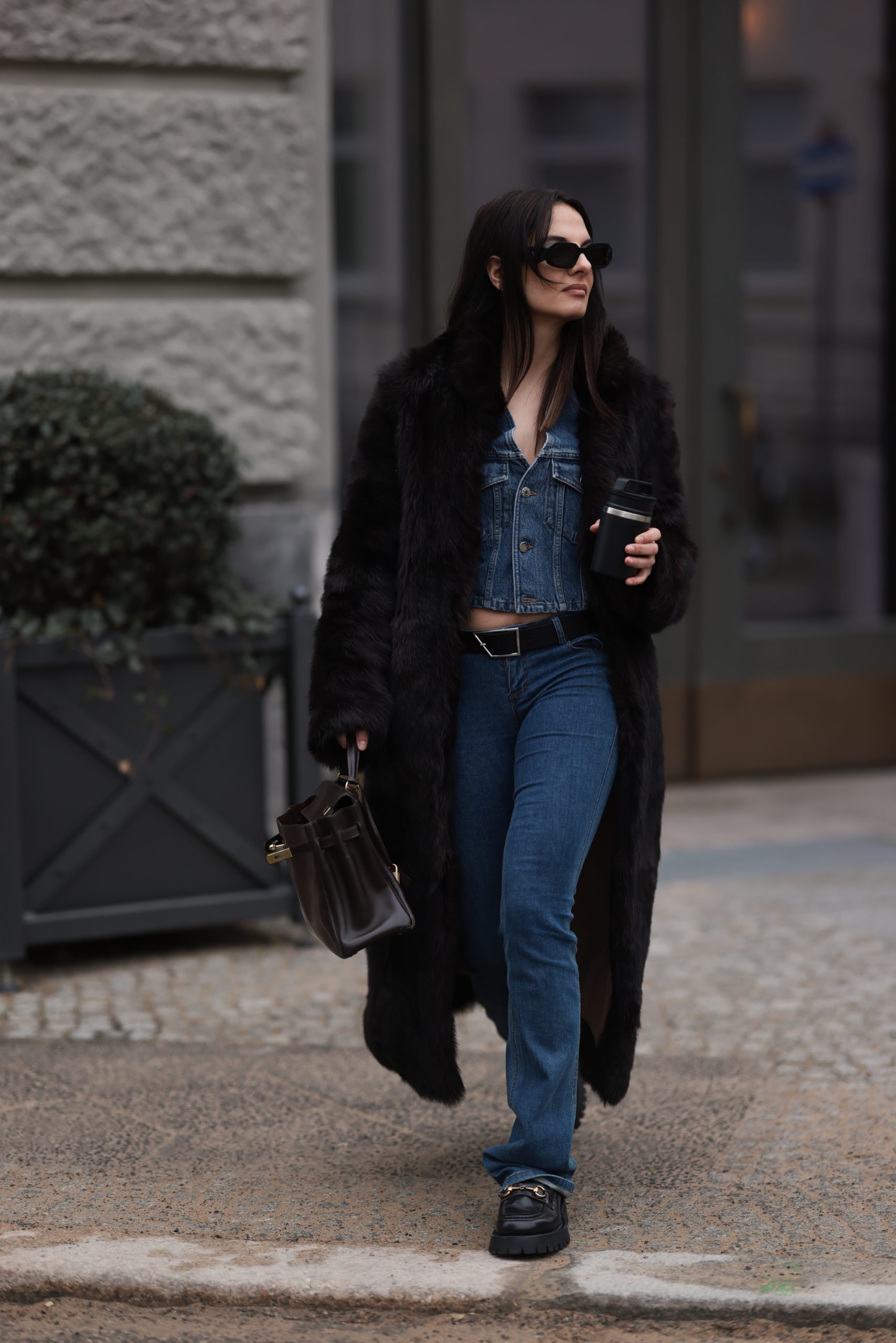 Layered Black Faux Fur Coat Over Denim Jacket for Street Style — Faux Fur Coat Outfits