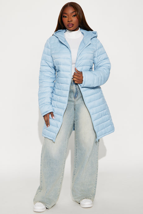 Light Blue Puffer Coat with Wide-Leg Jeans — Long Puffer Coat Outfits