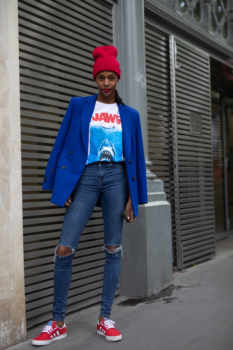 Red Beanie with Graphic Tee, Ripped Jeans, and Blue Blazer — Beanie Outfits