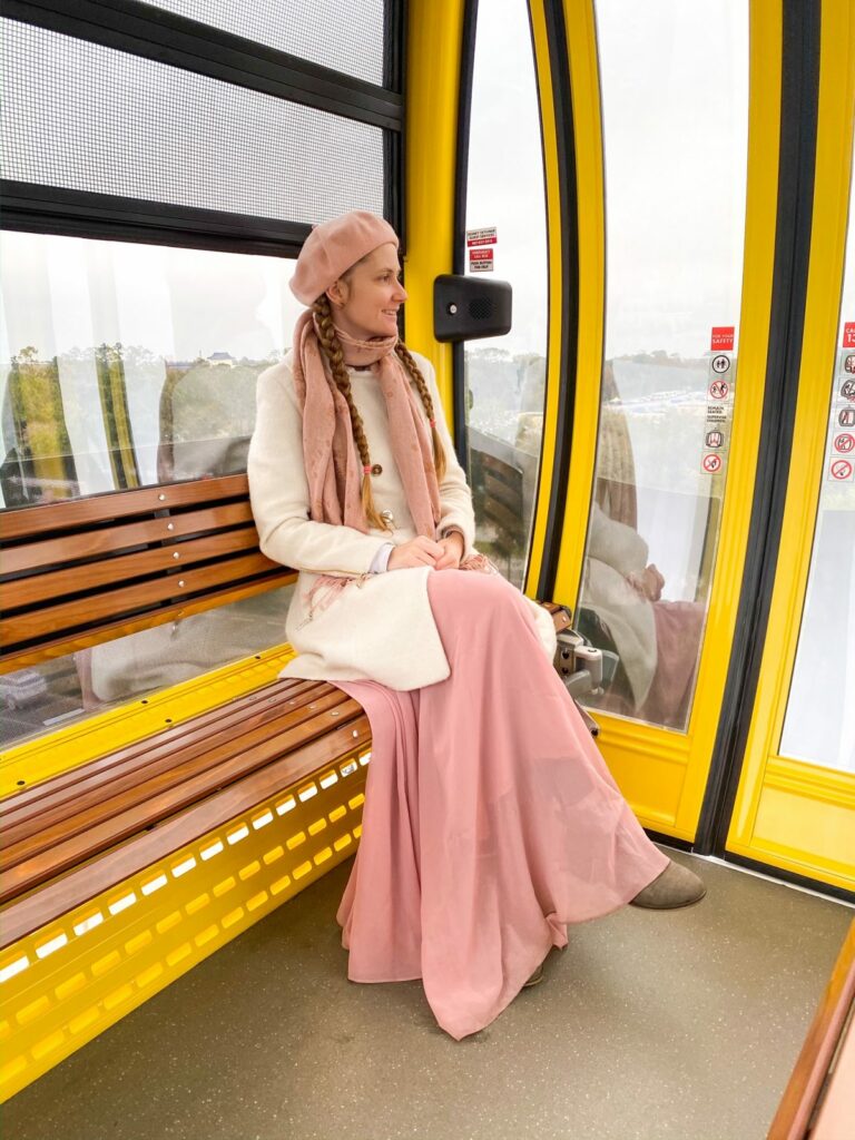 Cream Coat with Pink Scarf and Beret — Disney Winter Outfits