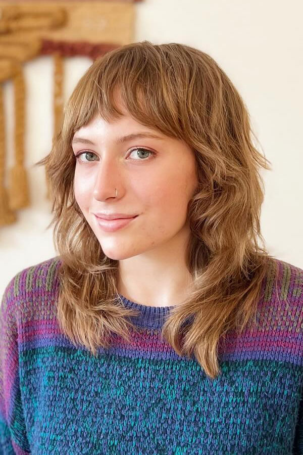 Medium Brown Collarbone Shag With Wispy Bangs Medium Brown Collarbone Shag With Wispy Bangs — Winter Shag Haircuts