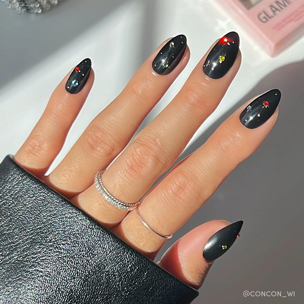Glossy Black Stilettos with Scattered Rhinestones — Winter Black Nails