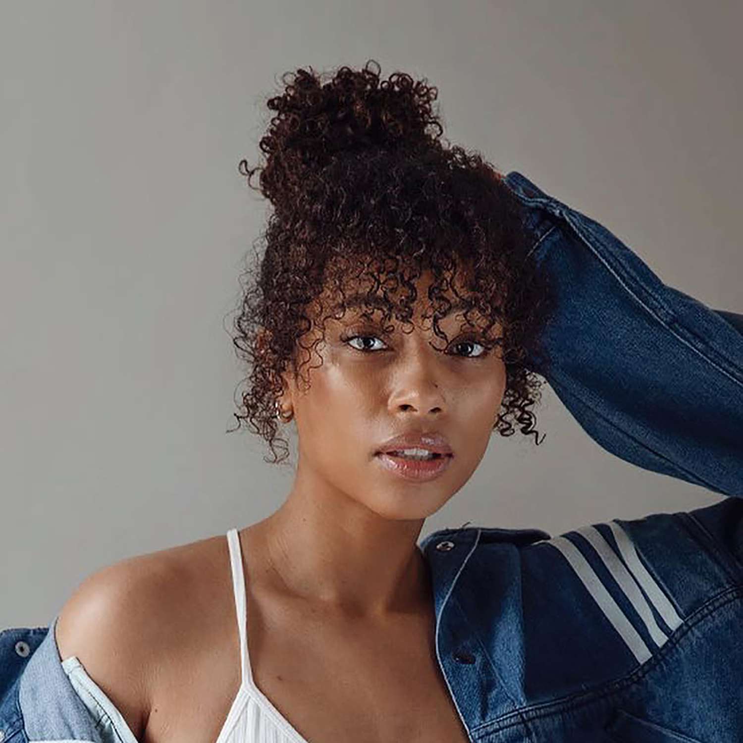 Curly Tendrils and Wispy Bangs Curly Tendrils and Wispy Bangs — Winter Hairstyles for Curly Hair
