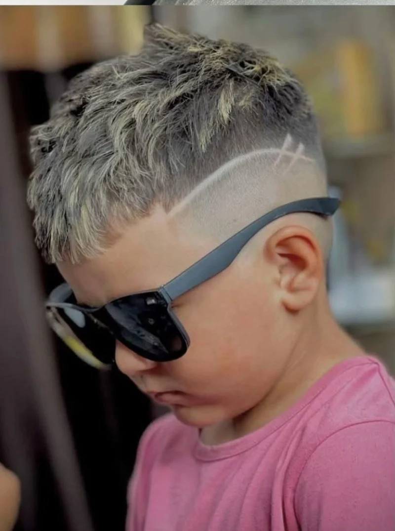 Fade With Carved Design Fade With Carved Design — Winter Haircuts for Boys