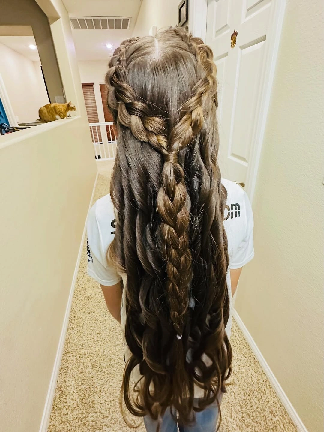Very long hair with side braids and central braid